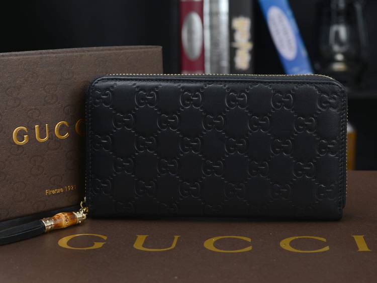 グッチコピー 財布 GUCCI 2014秋冬新作 高品質 本革 GG 柄 エンボス ラウンドファスナー長財布 メンズ 財布 ブラック 232977