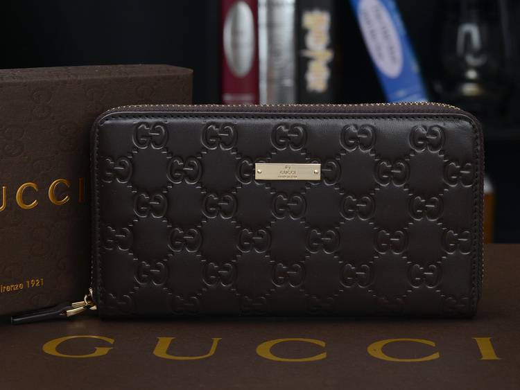 グッチコピー 財布 GUCCI 2014秋冬新作 高品質 本革 GG 柄 エンボス ラウンドファスナー長財布 メンズ 財布 ブラウン 244994